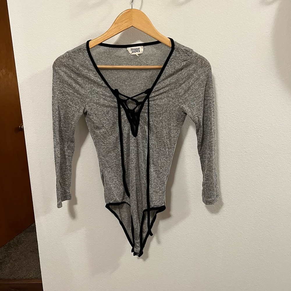 NWOT body suit with lace up detail
